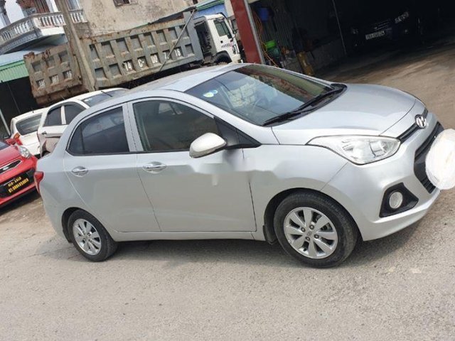 Cần bán xe Hyundai Grand i10 MT năm sản xuất 2015, màu bạc số sàn, giá tốt