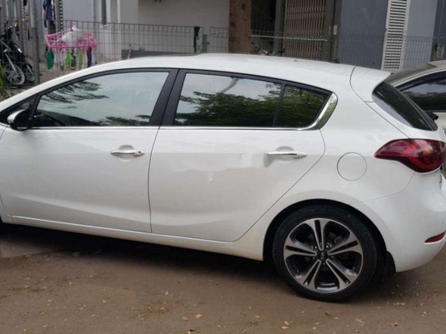 Bán Kia Cerato AT sản xuất năm 2013, màu trắng, xe nhập0