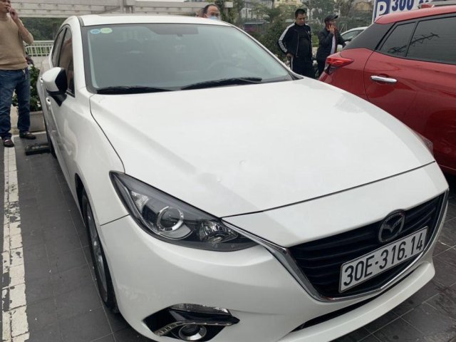 Cần bán xe Mazda 3 đời 2015, màu trắng giá cạnh tranh