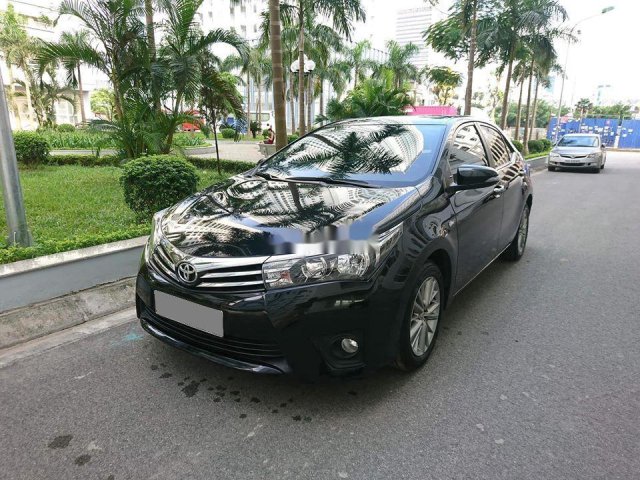 Cần bán gấp Toyota Corolla Altis sản xuất năm 2014, màu đen như mới giá cạnh tranh0