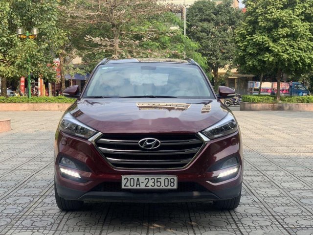 Cần bán lại xe Hyundai Tucson 2.0AT năm 2017, màu đỏ0