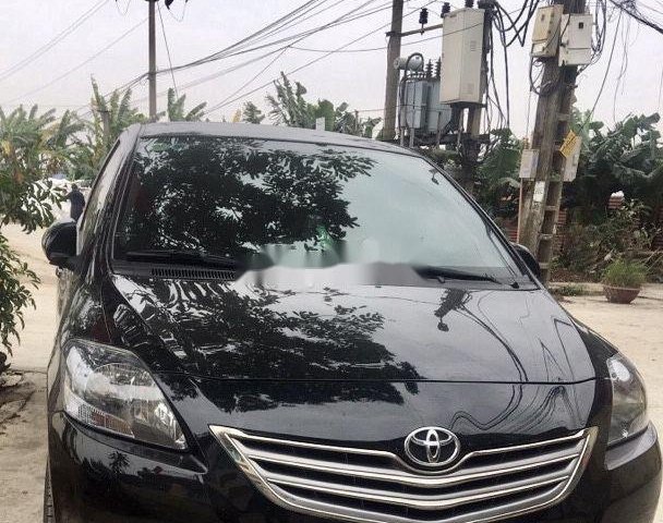 Cần bán Toyota Vios 1.5E sản xuất năm 2013, màu đen0