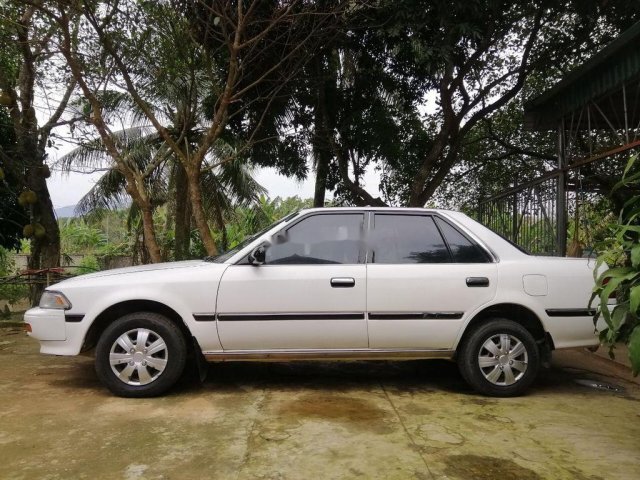 Xe Toyota Corolla năm 1990, màu trắng, nhập khẩu nguyên chiếc0