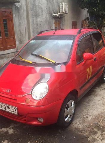 Cần bán Daewoo Matiz SE đời 2005, màu đỏ xe gia đình0