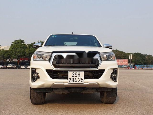 Cần bán lại xe Toyota Hilux 2.8 G Platinum đời 2019, màu trắng, xe nhập chính chủ0