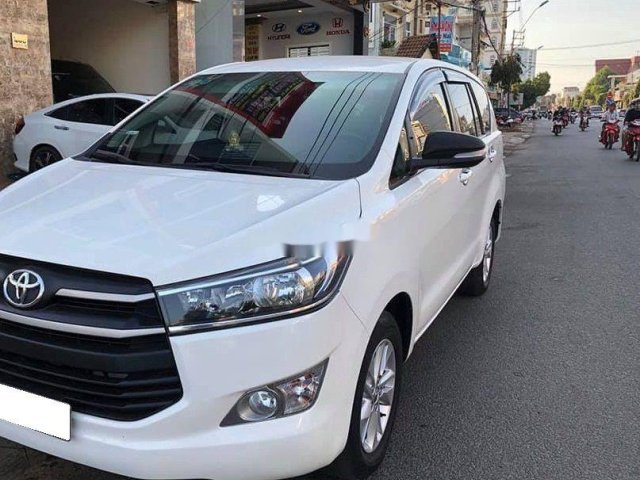 Bán ô tô Toyota Innova sản xuất năm 2018, màu trắng số sàn, 623 triệu