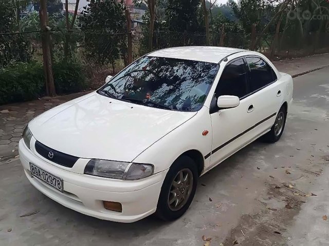 Bán Mazda 323 đời 1999, màu trắng, giá 90 triệu0