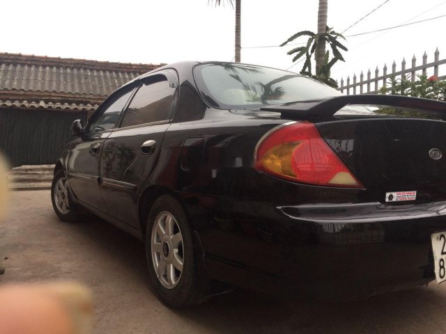 Bán Kia Spectra sản xuất 2003, màu đen, 90tr0