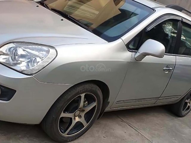 Bán Kia Carens 2.0 MT 2010, màu bạc0