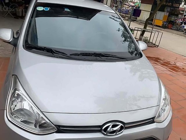 Bán ô tô Hyundai Grand i10 1.2 MT đời 2015, màu bạc, xe nhập  0