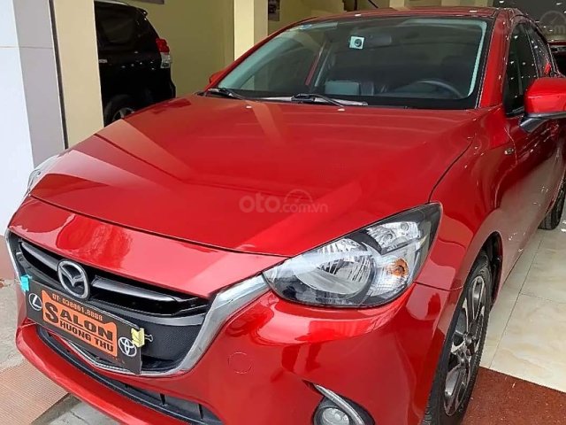 Cần bán xe Mazda 2 1.5 AT năm 2016, màu đỏ số tự động0