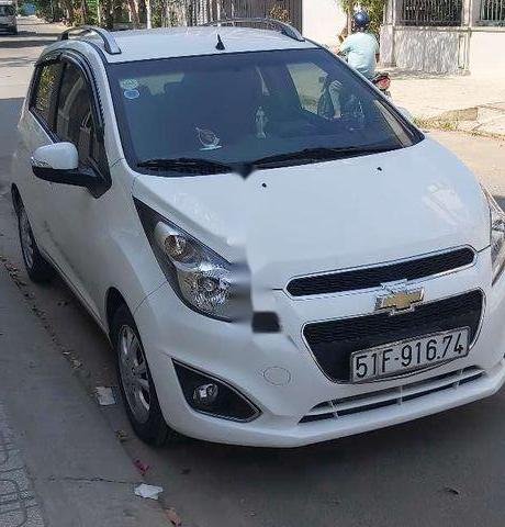 Bán xe Chevrolet Spark 1.2 LT đời 2016, màu trắng giá cạnh tranh0