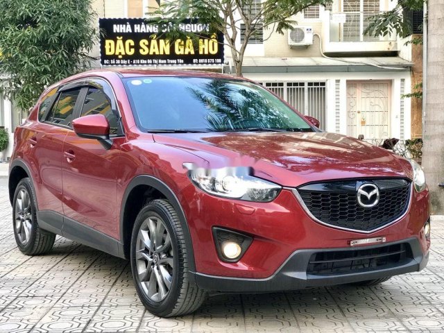 Cần bán Mazda CX 5 2.0AT 4WD năm sản xuất 2013, màu đỏ0