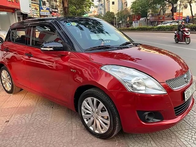 Bán ô tô Suzuki Swift 1.4 AT sản xuất năm 2014, màu đỏ