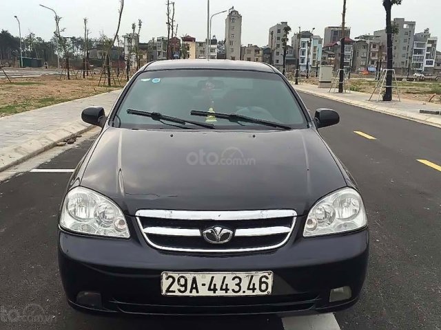 Cần bán xe Daewoo Lacetti EX đời 2009, màu đen số sàn0