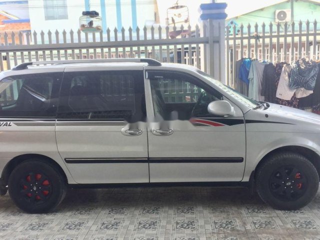 Gia đình bán Kia Carnival năm 2007, màu bạc, xe nhập, BSTP