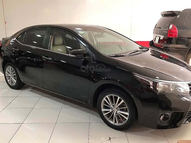 Bán Toyota Corolla Altis 1.8G AT 2015, màu đen, 600tr