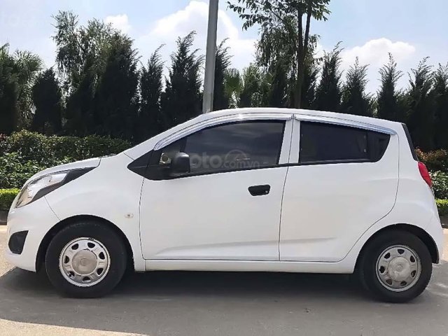 Cần bán Chevrolet Spark AT sản xuất 2014, màu trắng, nhập khẩu, 195 triệu0