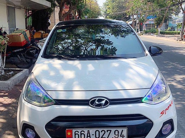 Cần bán gấp Hyundai Grand i10 năm sản xuất 2014, màu trắng, nhập khẩu nguyên chiếc