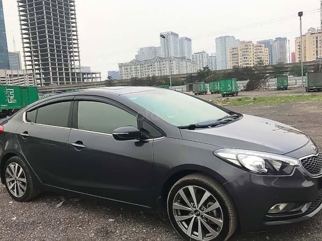 Cần bán xe Kia K3 1.6 AT đời 2015, màu nâu chính chủ giá cạnh tranh