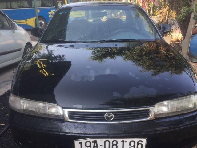 Cần bán gấp Mazda 626 đời 1998, màu đen chính chủ0