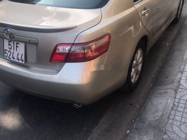 Cần bán gấp Toyota Camry đời 2007, màu vàng, nhập khẩu, giá tốt0