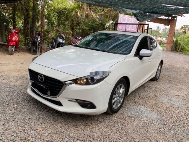 Bán ô tô Mazda 3 1.5 FL năm 2017, màu trắng, giá 592tr