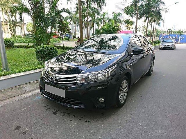 Cần bán Toyota Corolla Altis năm 2014, màu đen như mới0