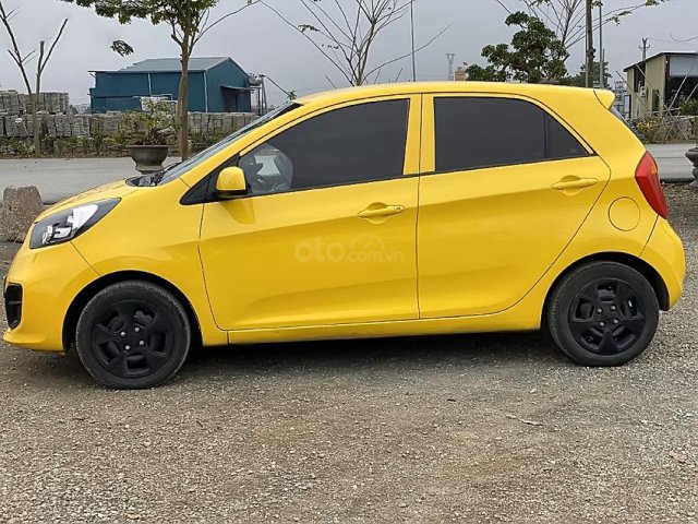 Bán xe Kia Morning 1.0 MT sản xuất năm 2015, màu vàng chính chủ, giá tốt