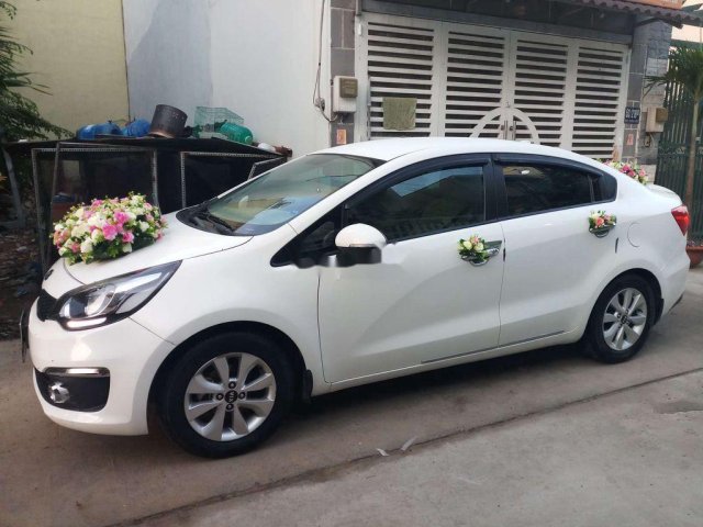 Cần bán Kia Rio sản xuất 2016, màu trắng, xe nhập xe gia đình0