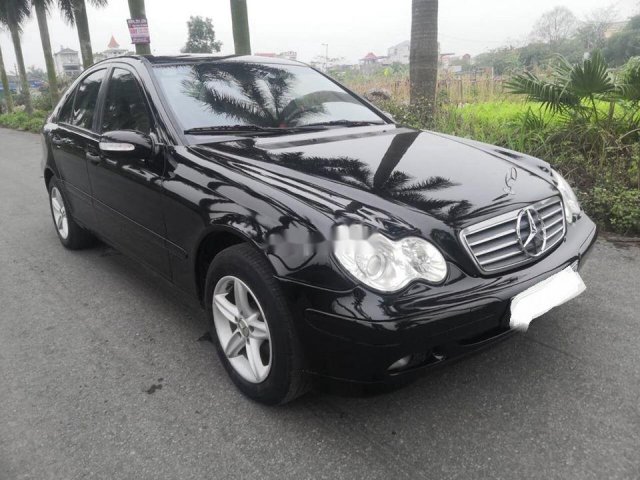 Bán xe Mercedes C200 đời 2002, màu đen số tự động0