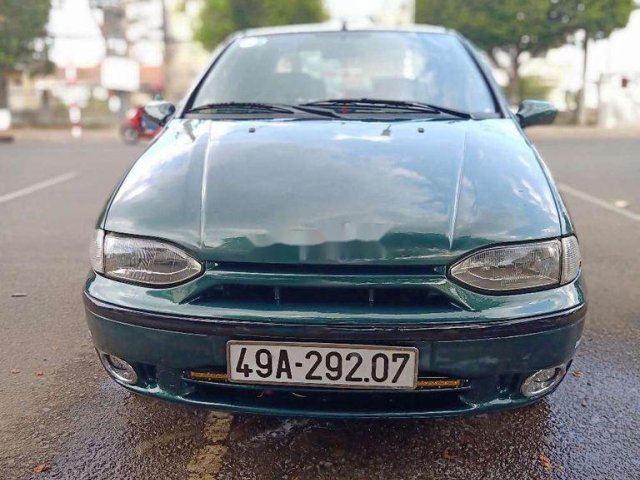 Cần bán gấp Fiat Siena năm 2003, màu xanh lục xe gia đình0