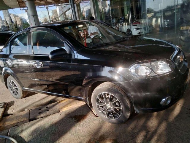 Cần bán lại xe Daewoo Gentra đời 2011, màu đen số sàn0