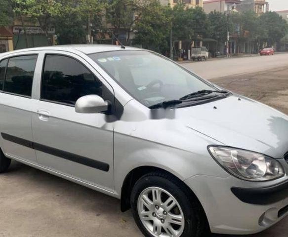 Bán ô tô Hyundai Getz đời 2009, màu bạc chính chủ0