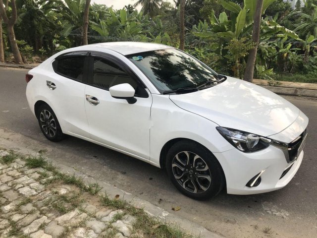 Bán ô tô Mazda 2 sản xuất năm 2016, màu trắng xe gia đình giá cạnh tranh