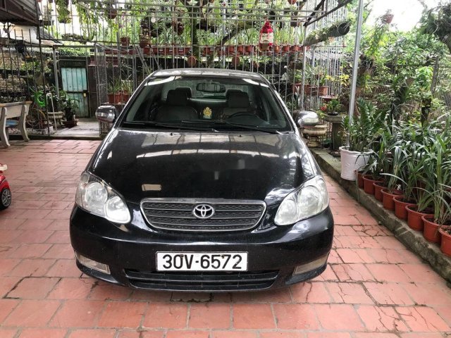 Bán Toyota Corolla Altis năm sản xuất 2003, màu đen, 135 triệu0