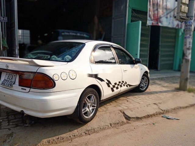 Bán xe Mazda 323 sản xuất năm 1998, màu trắng, xe nhập