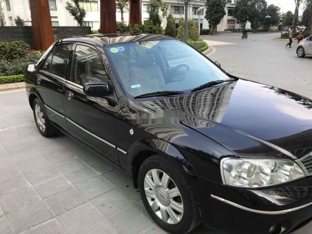 Bán Ford Laser năm sản xuất 2006, màu đen xe gia đình, 215tr