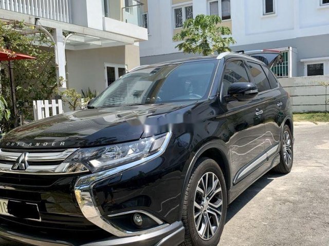 Cần bán xe Mitsubishi Outlander 2018, màu đen còn mới giá cạnh tranh