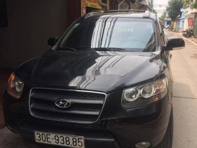 Cần bán lại xe Hyundai Santa Fe năm 2009, màu đen, nhập khẩu số sàn, giá tốt0