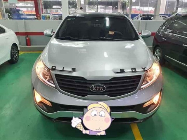 Cần bán Kia Sportage đời 2010, màu bạc, xe nhập, số tự động0