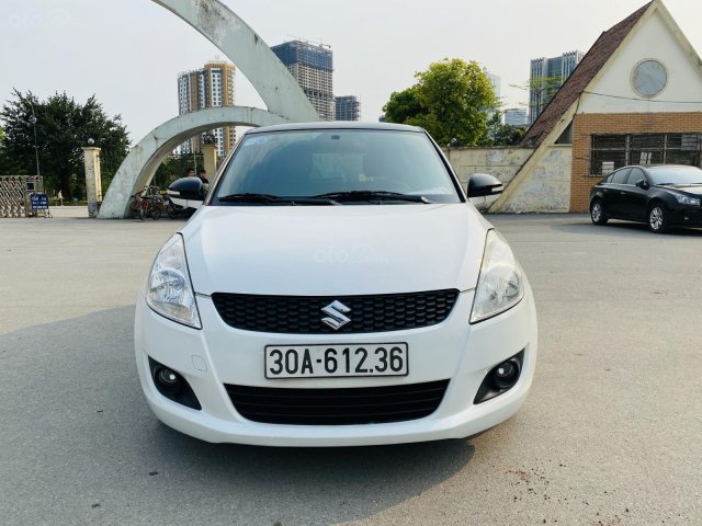 Chính chủ bán Suzuki Switf 1.4 trắng da bò0