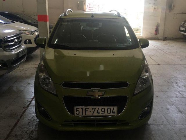 Cần bán Chevrolet Spark năm sản xuất 2014, màu xanh lục0