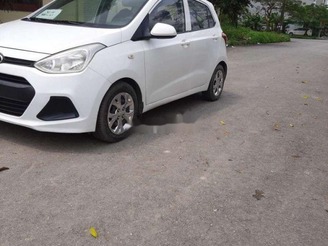 Bán xe Hyundai Grand i10 năm sản xuất 2014, màu trắng, nhập khẩu số sàn0