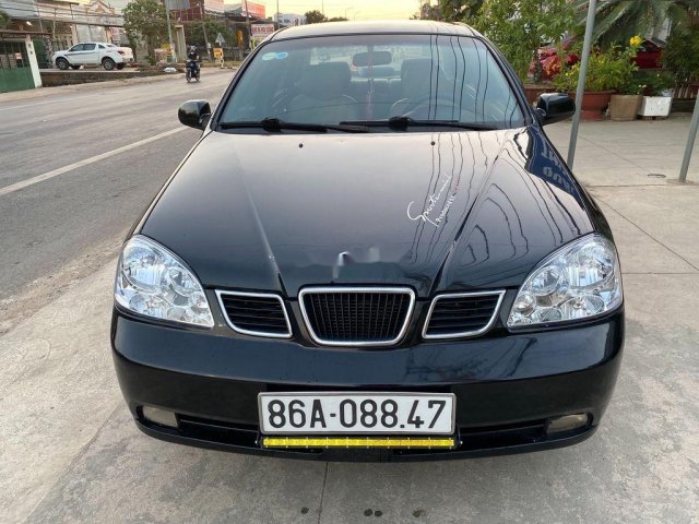 Xe Daewoo Lacetti sản xuất năm 2005, màu đen, xe nhập0