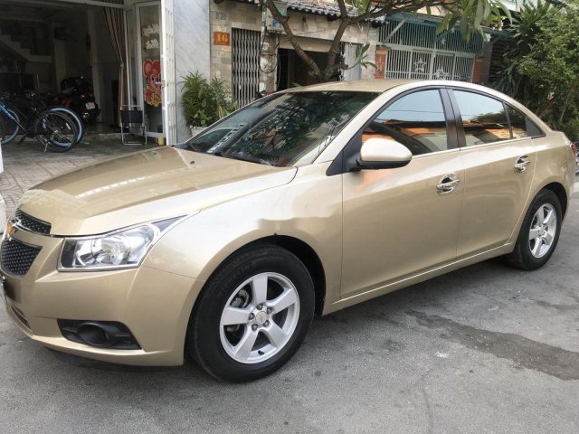 Cần bán gấp Chevrolet Cruze đời 2013, màu vàng còn mới giá cạnh tranh