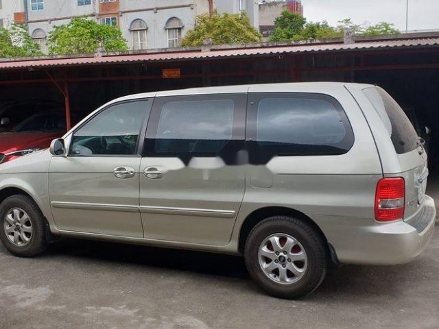 Bán xe Kia Carnival đời 2009, màu bạc