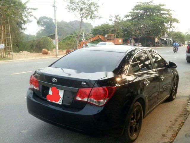 Bán Chevrolet Cruze 2010, màu đen  0