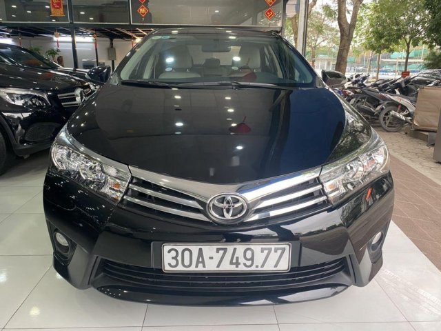 Cần bán xe Toyota Corolla Altis đời 2015, màu đen0