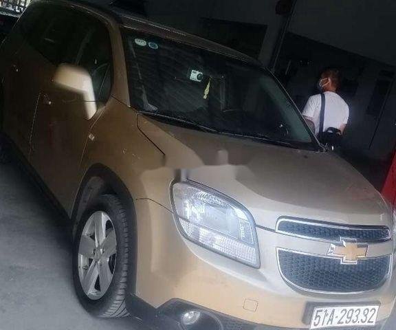 Cần bán xe Chevrolet Orlando đời 2012, màu vàng, nhập khẩu 0